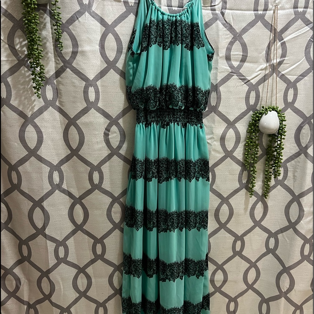 Floor length teal and black lace gown by sweet storm